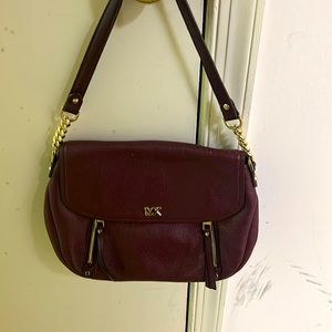 Burgundy Michael Kors small shoulder bag, gently used